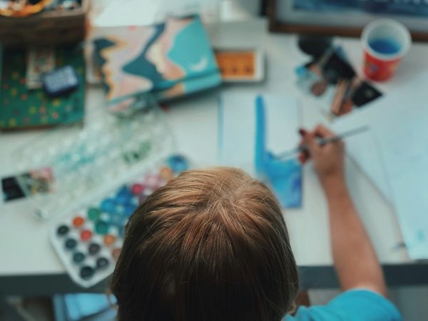 person painting - Creative Hobbies to Try
