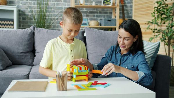 kid playing with blocks - Occupational Therapy Group Activities for Kids