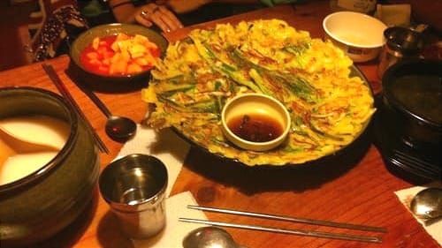 Korean Seafood Pancake (Haemul Pajeon) and traditional korean rice wine (Makgeolli)