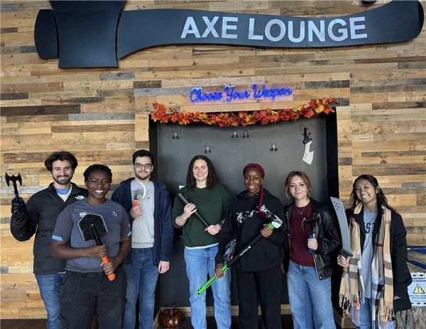 CyberRamblers and MSF Scholars Hit the Target at Axe Throwing Social
