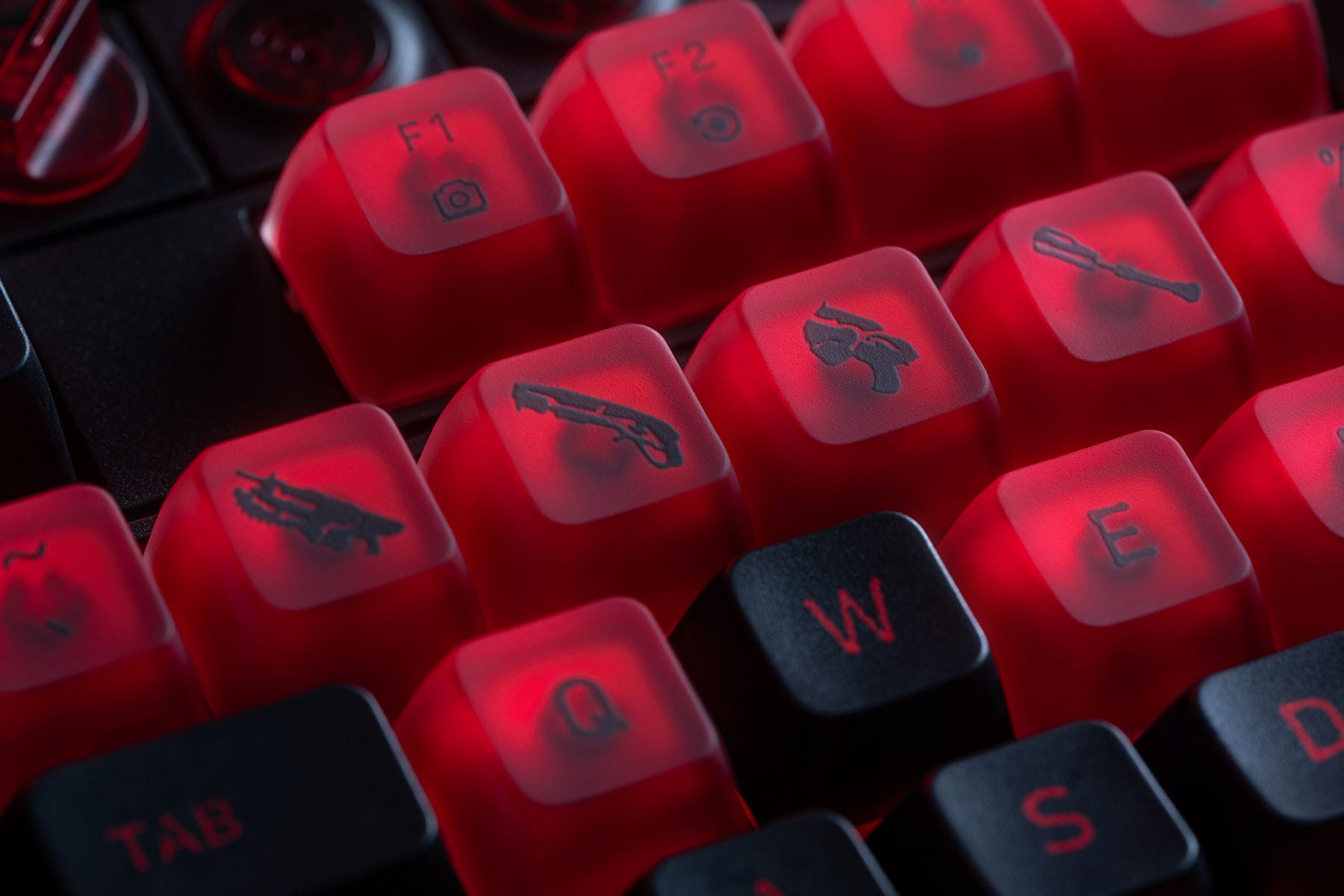 Red translucent keycaps with Lancer, Gnasher, Boltok and frag grenade icons on the number row