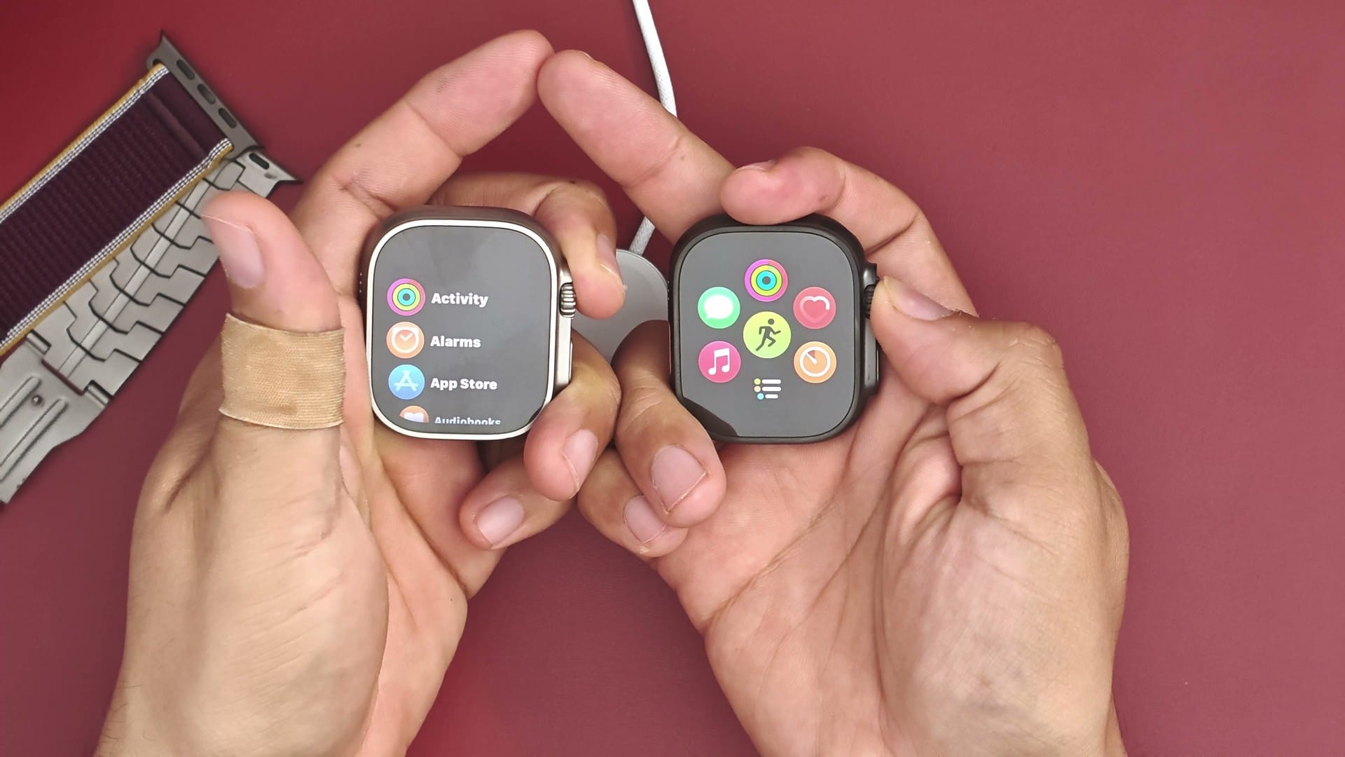 Apple Watch Ultra 2 and Ultra 4 held side by side with their screens on after setup