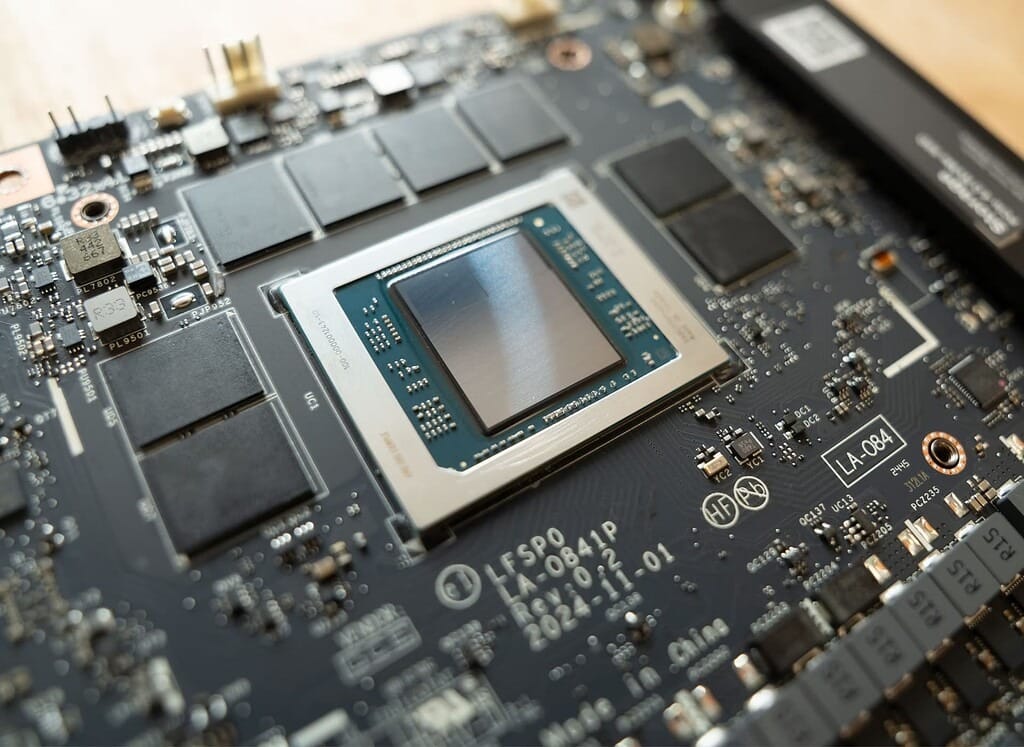 Close-up of the AMD processor and soldered memory on the Framework Desktop mainboard