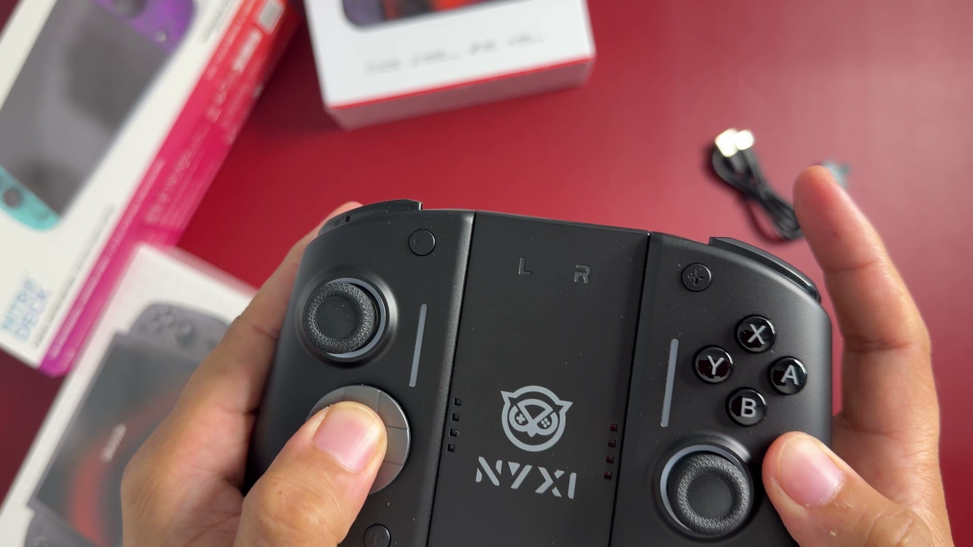 Close-up of the NYXI Hyperion 3 face buttons, D-pad and sticks