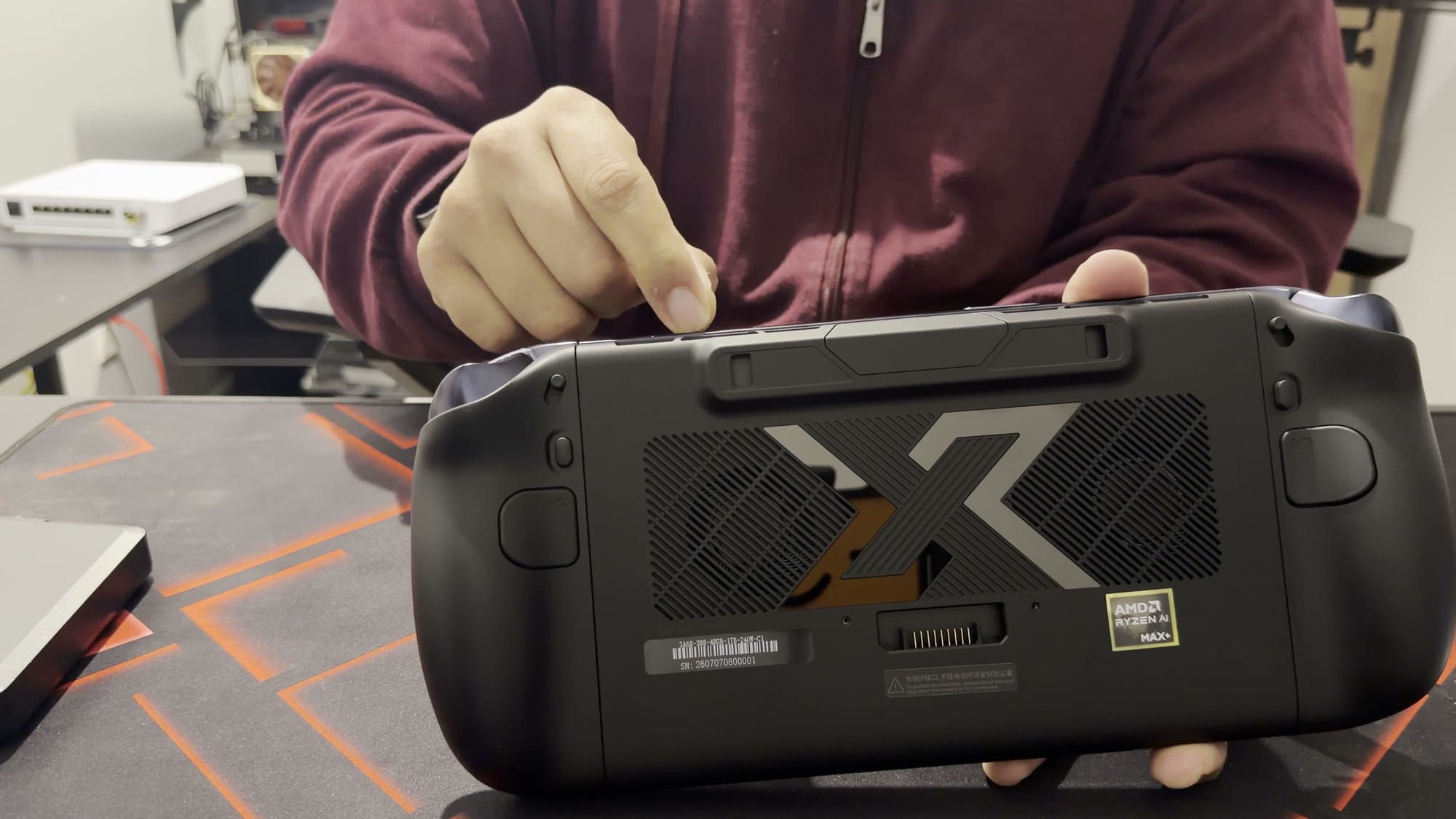 The back of the OneXPlayer X2 Mini Pro with its battery removed