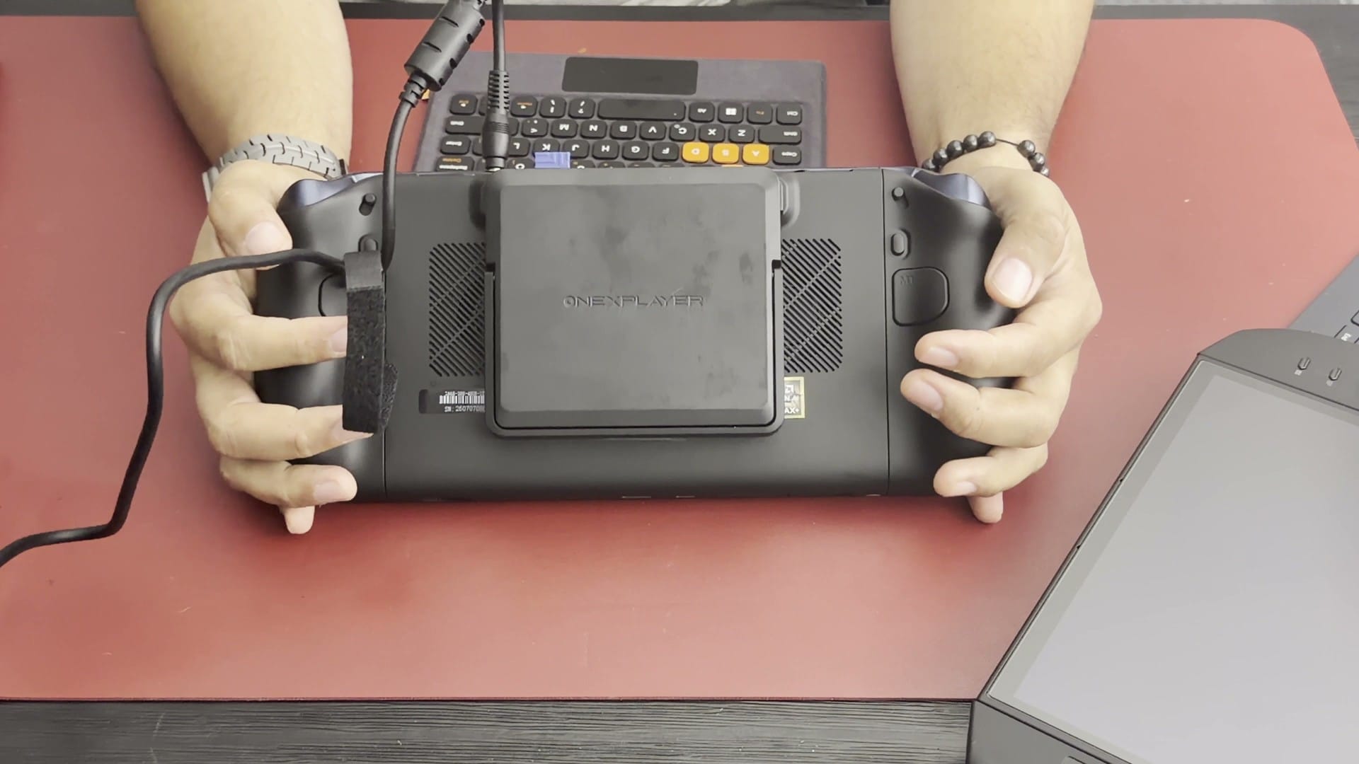Back of the OneXPlayer X2 Mini Pro with its removable battery pack