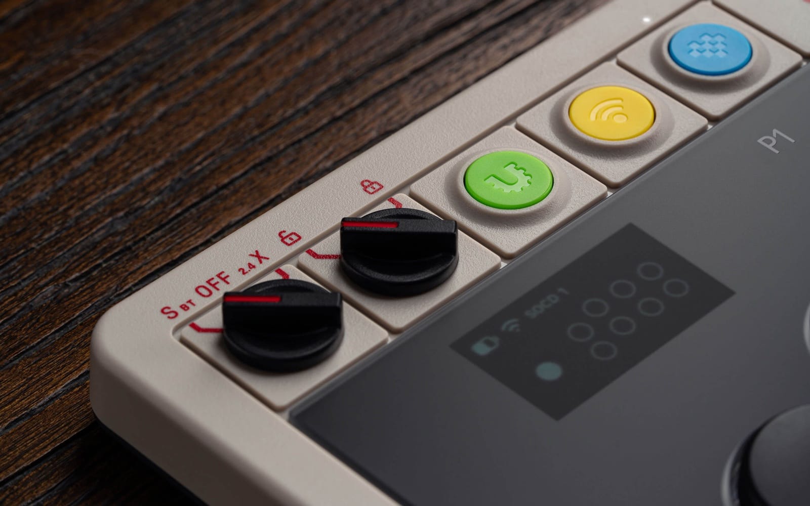 Close-up of the Arcade Controller Pro's dials and 1.47-inch display, showing SOCD mode 1