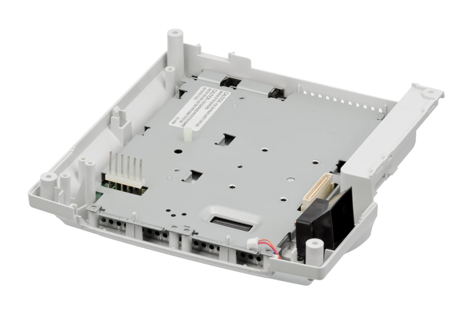 Sega Dreamcast case opened, showing the internal shielding