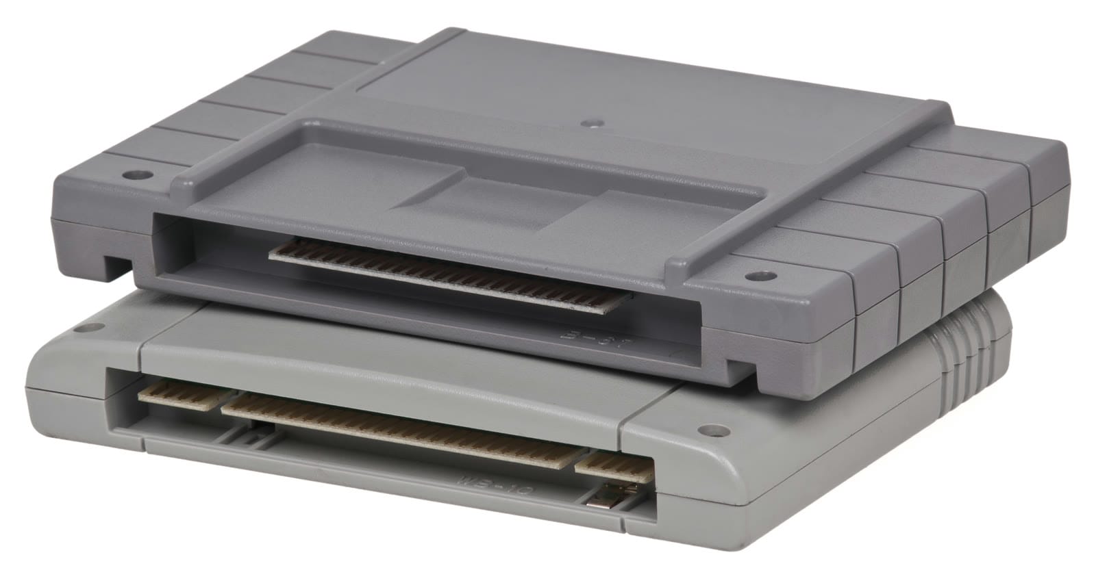 North American SNES cartridge on top of a Super Famicom cartridge