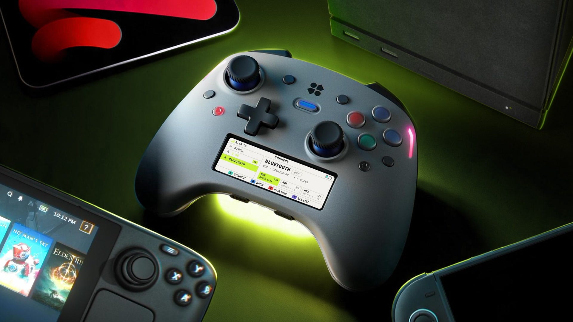 Genki Manta controller surrounded by an iPad, a Steam Deck, a Switch and a small PC