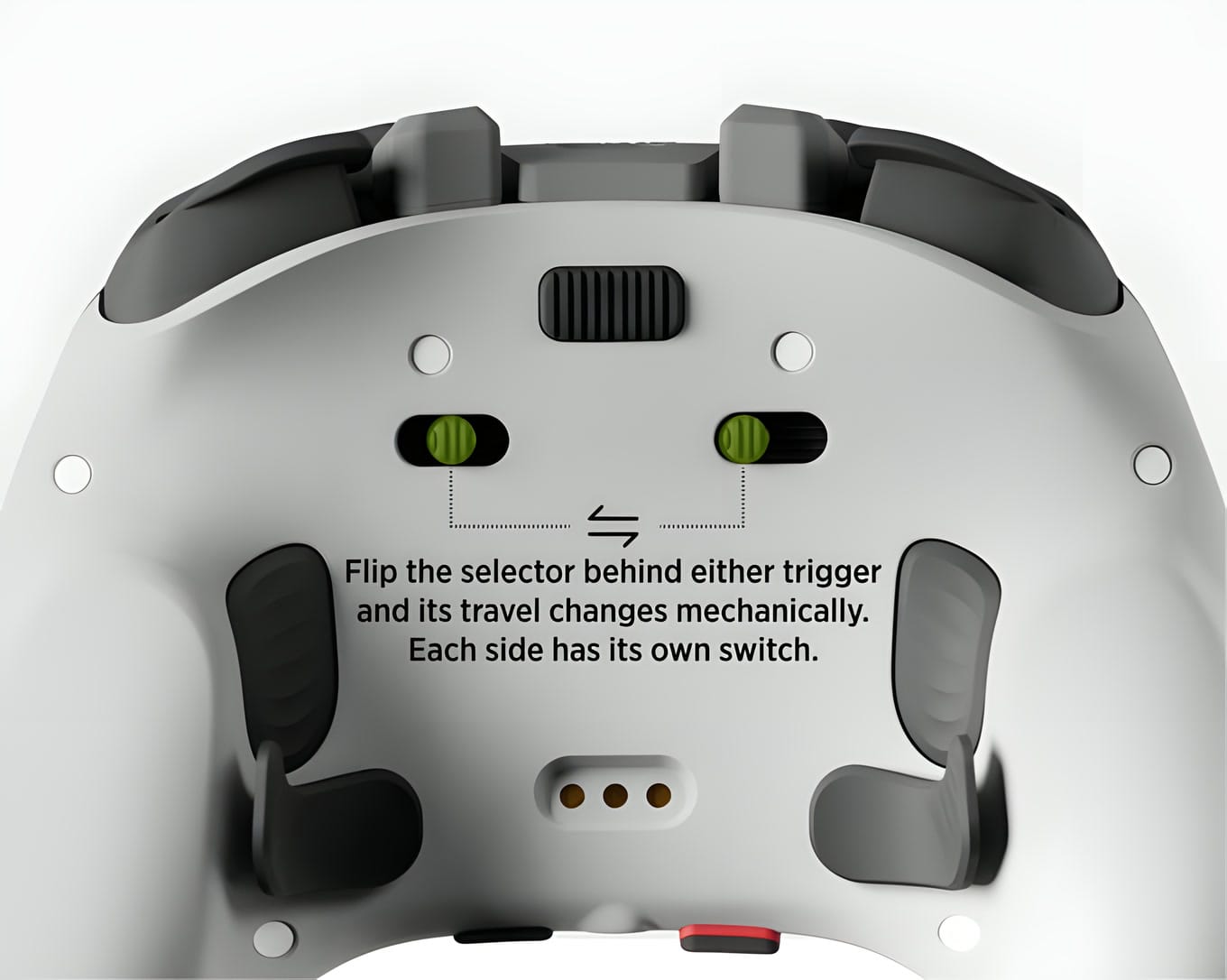 Back of the Genki Manta showing the trigger mode selectors, rear buttons and charging contacts