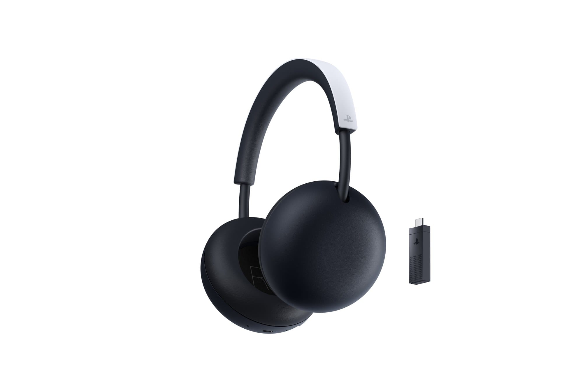 The white PlayStation Pulse headset next to its USB-C PlayStation Link adapter