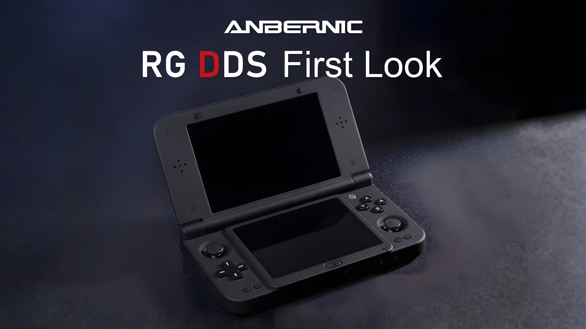 The black Anbernic RG DDS open on a dark fabric surface