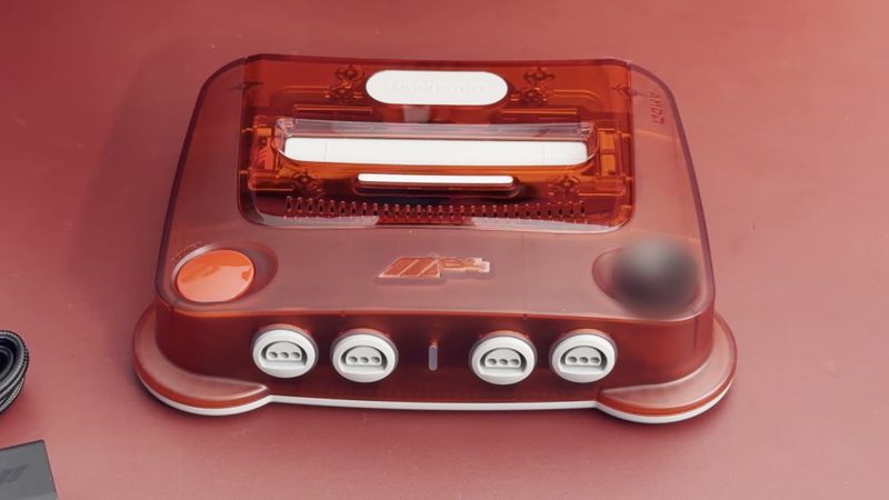 Transparent red ModRetro M64 on a red mat