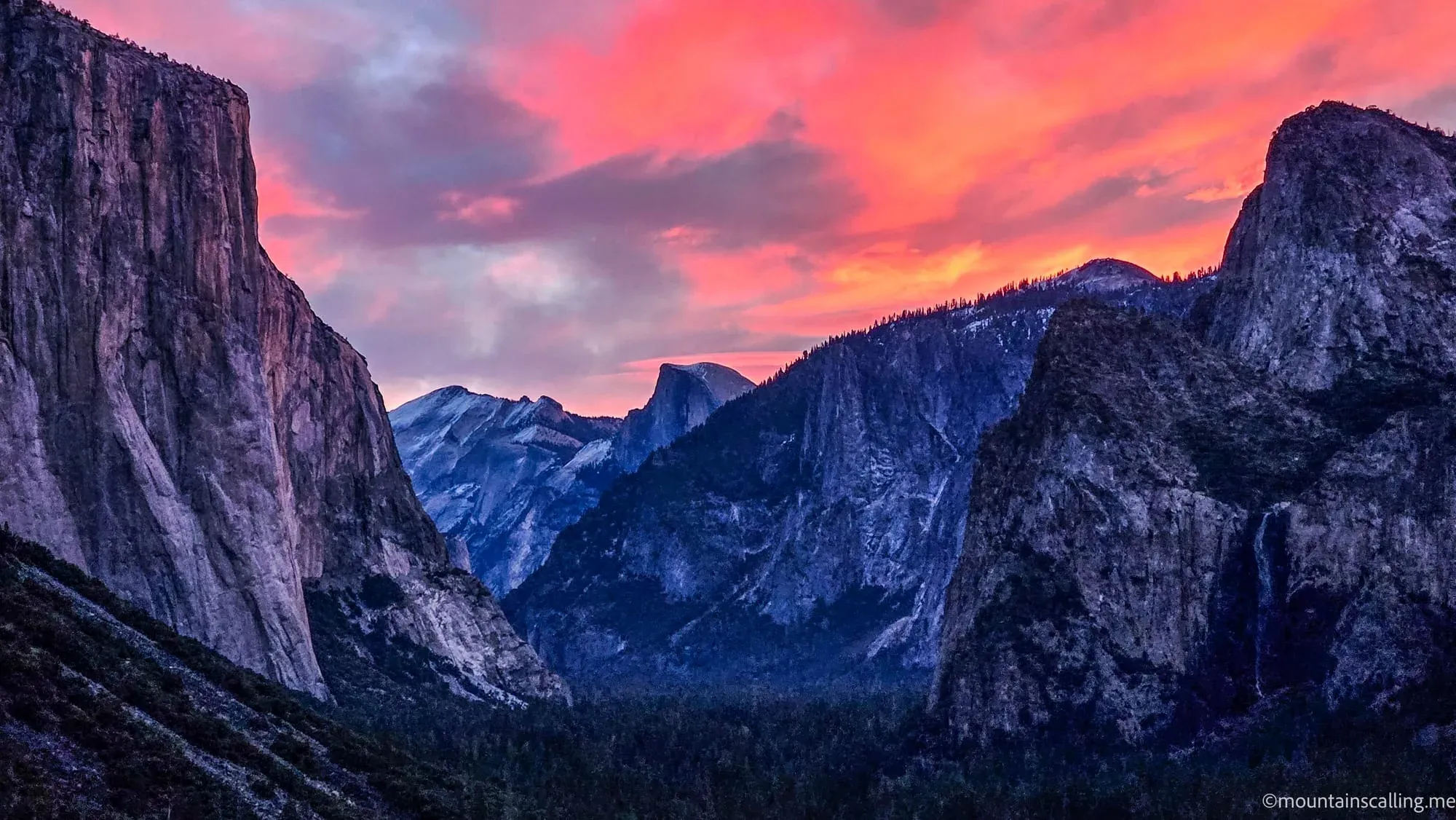 Yosemite Valley at sunset with El Capitan, Half Dome, and Bridalveil Fall under dramatic pink and purple clouds