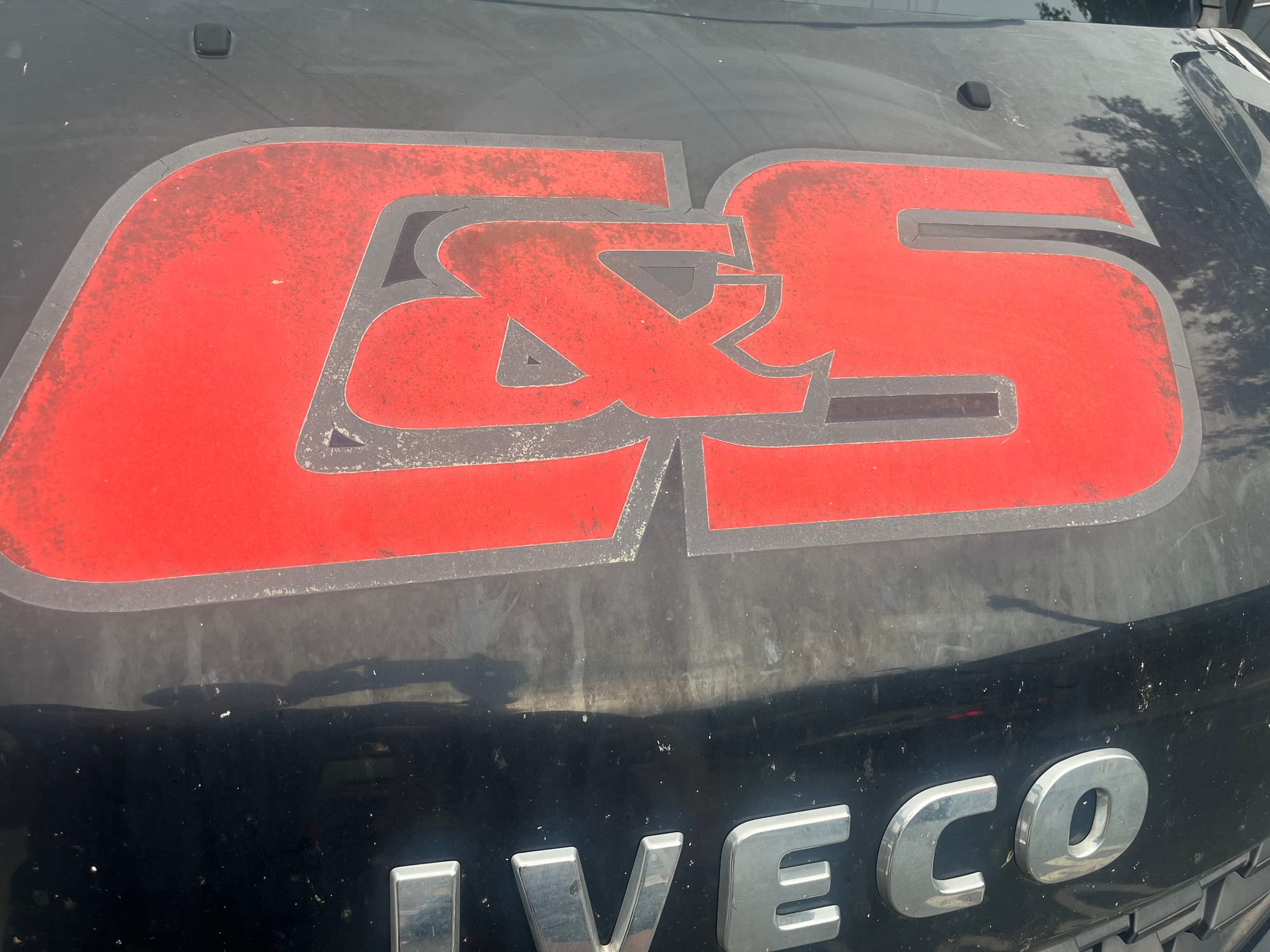 a tow truck with the initials C&S on the hood