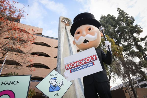 Mr. Monopoly visits City Hall seeking community input on the forthcoming MONOPOLY: Riverside Edition board game