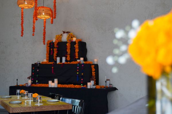 Bar Ni Modo Hosts Community Día de los Muertos Ofrenda