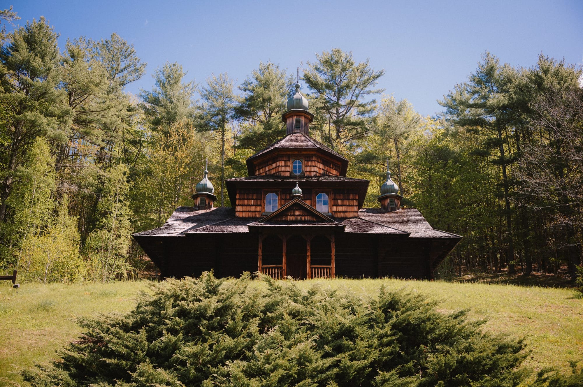 A wooden church among pines