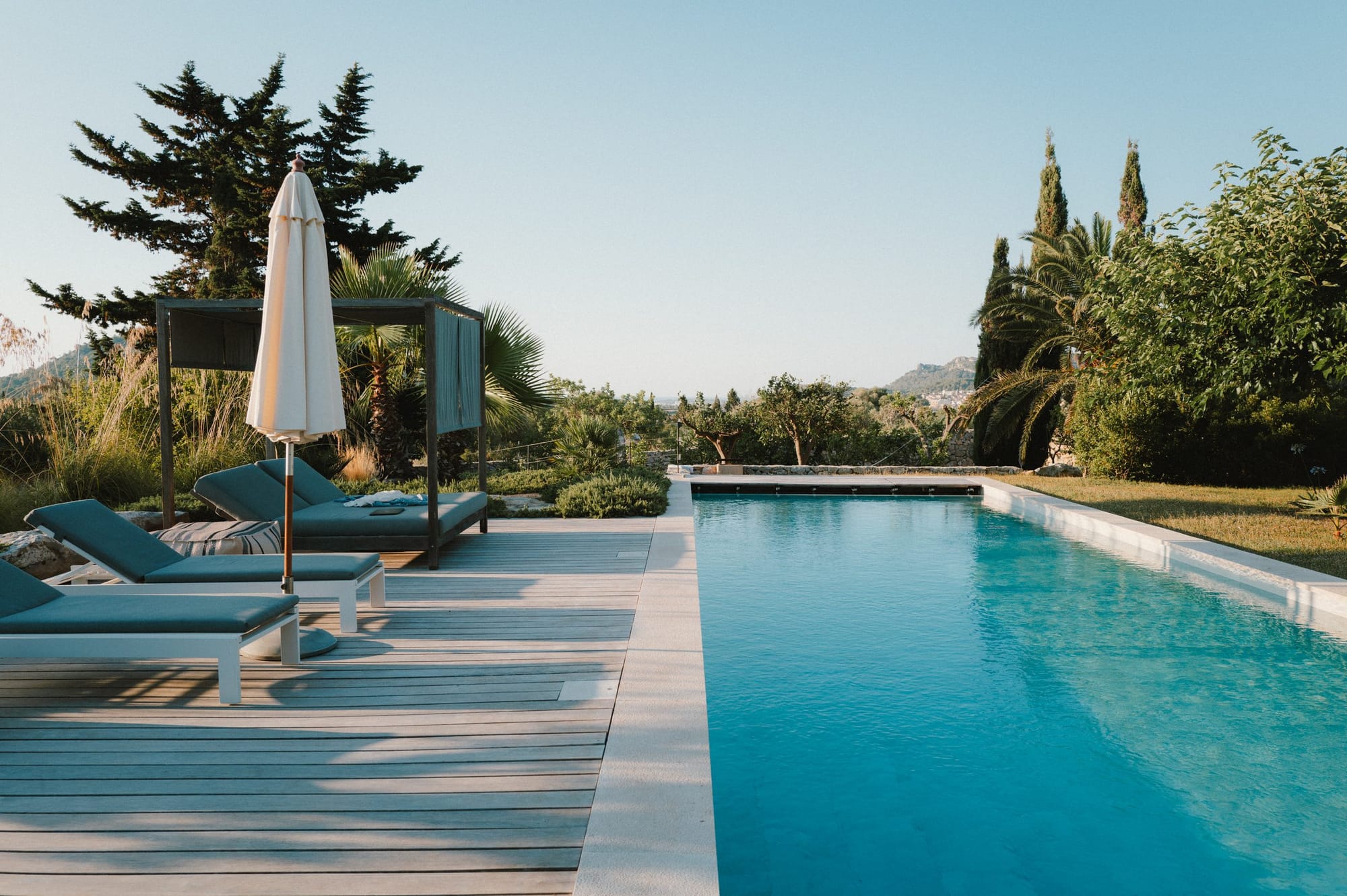 A pool among cypresses