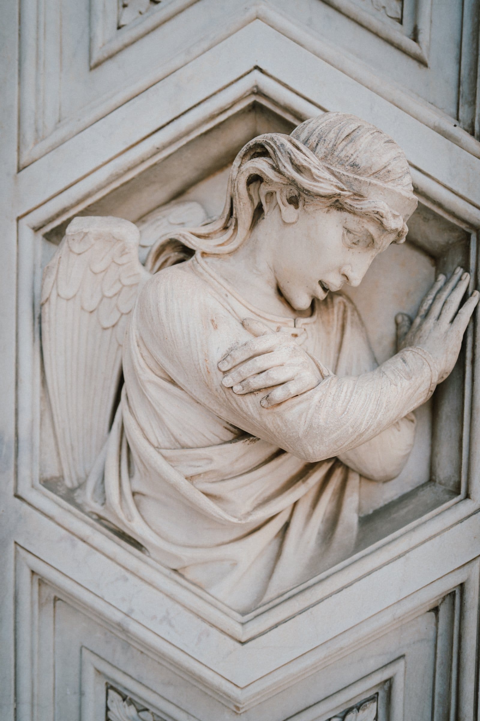A carved angel in marble