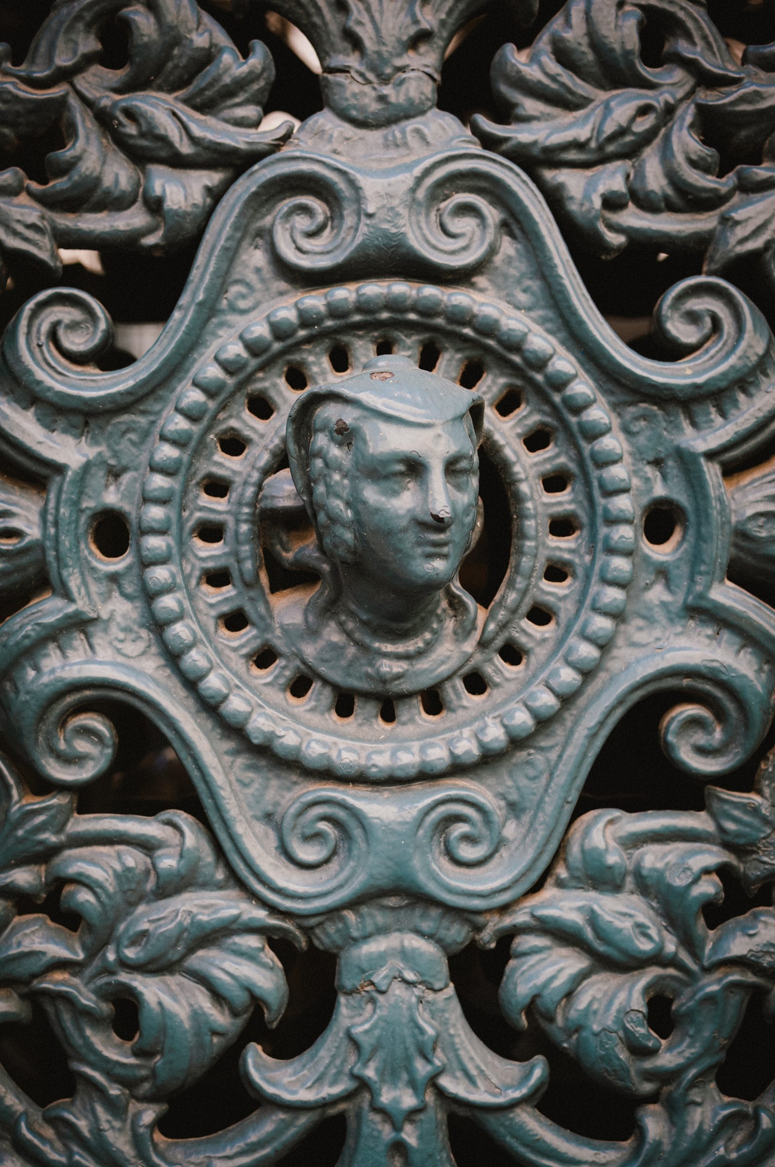 A door’s medallion, cast in iron.