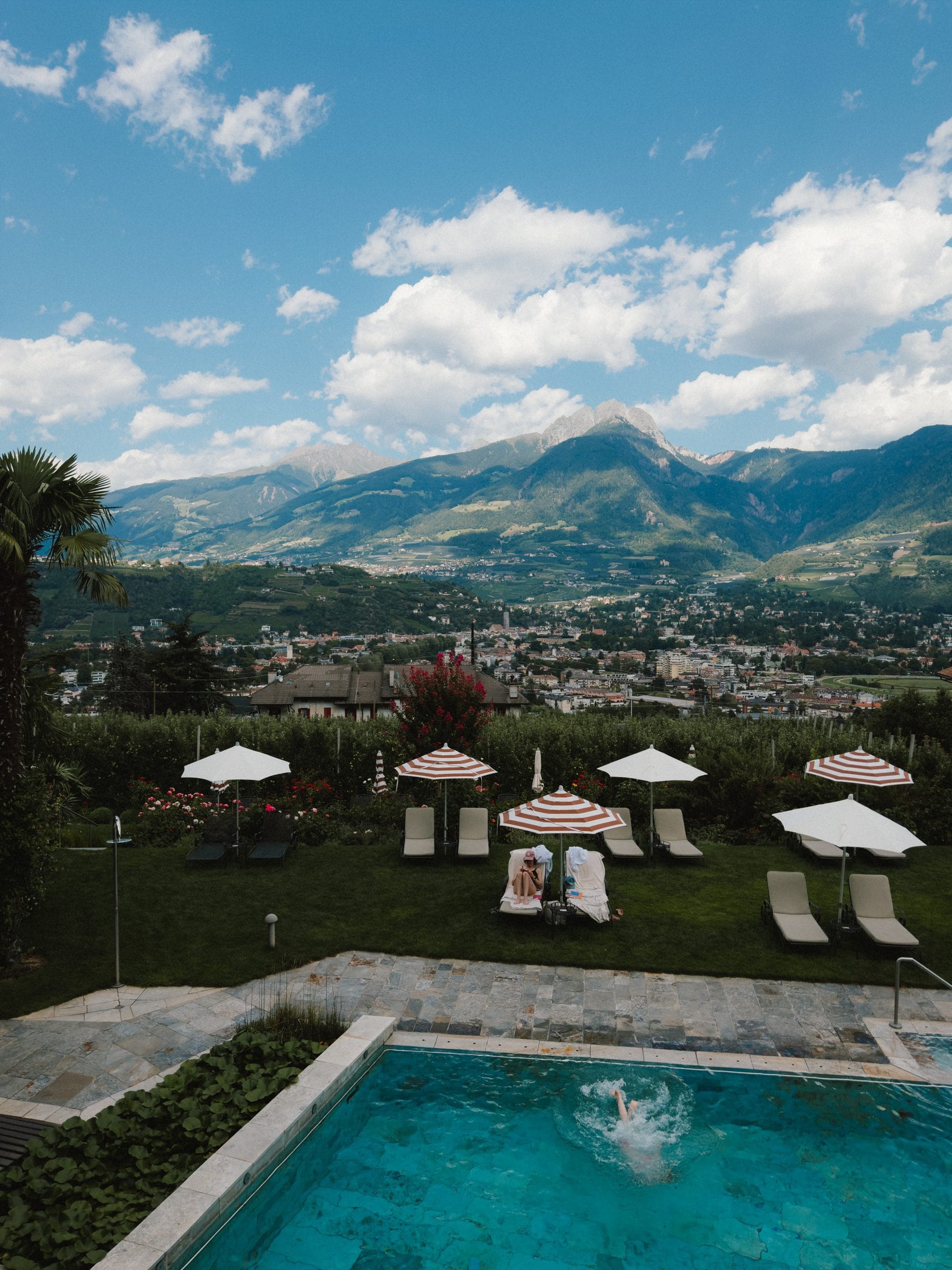 A pool and garden above the valley