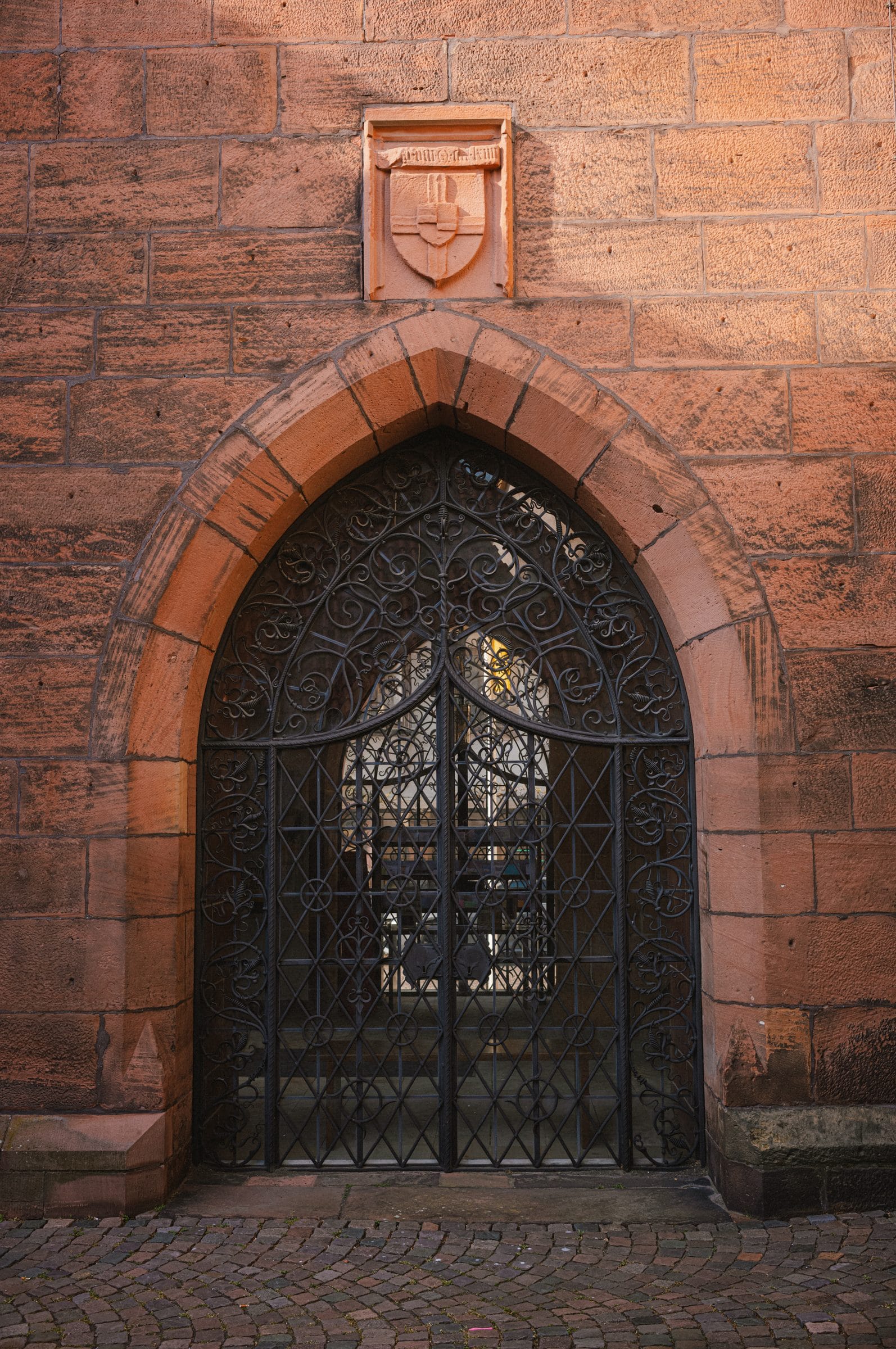 A Gothic gate in red sandstone