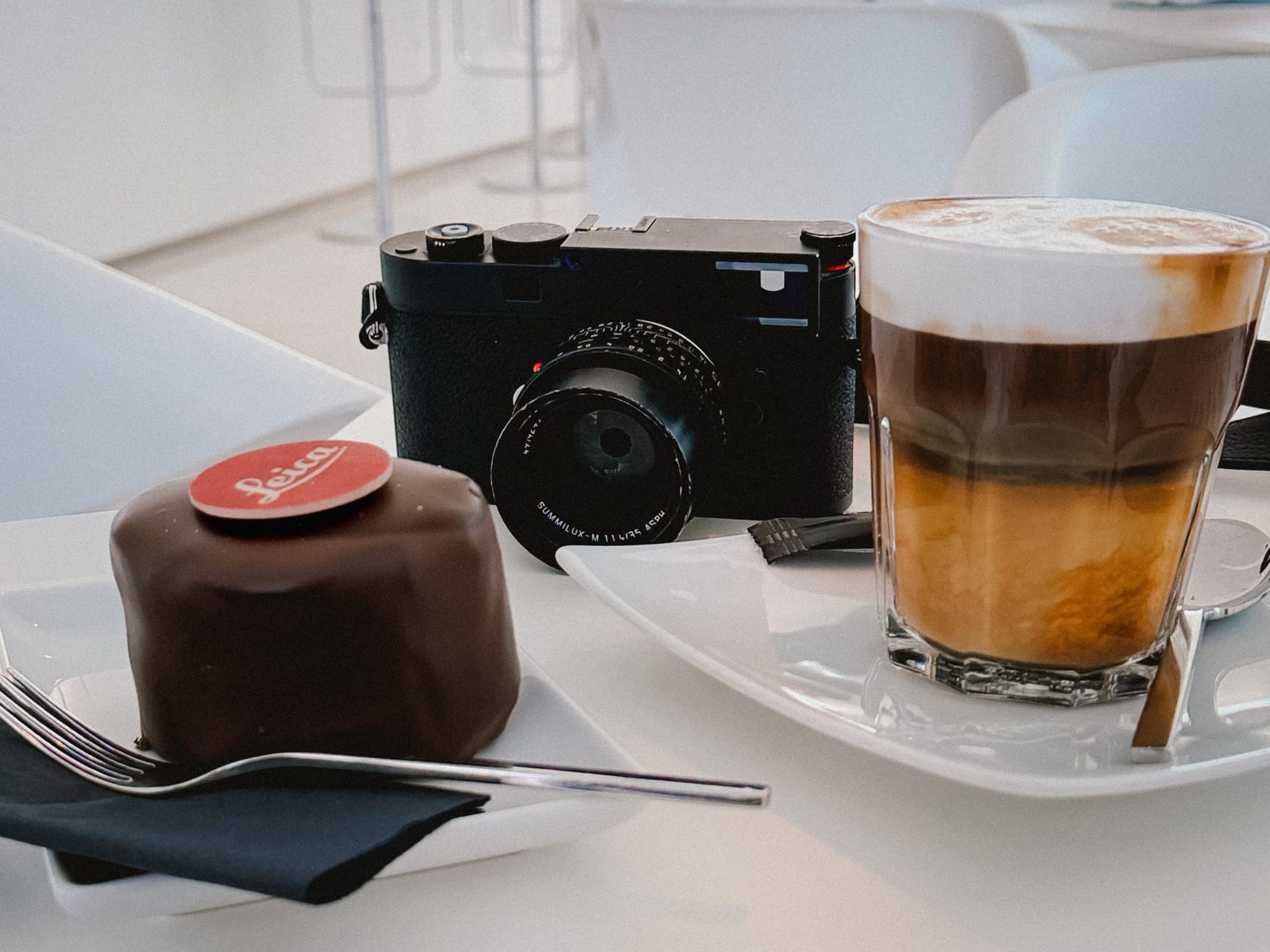 A Leica, cake and coffee