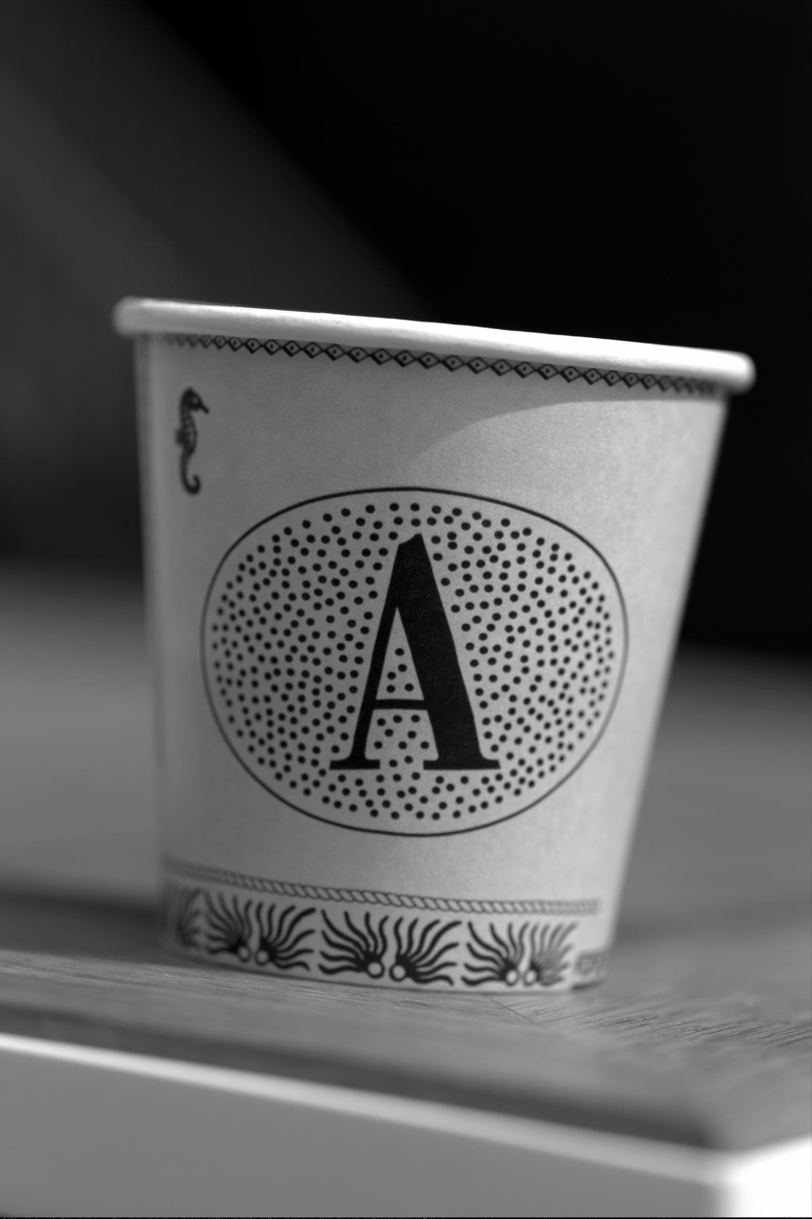 The A, on a cup.