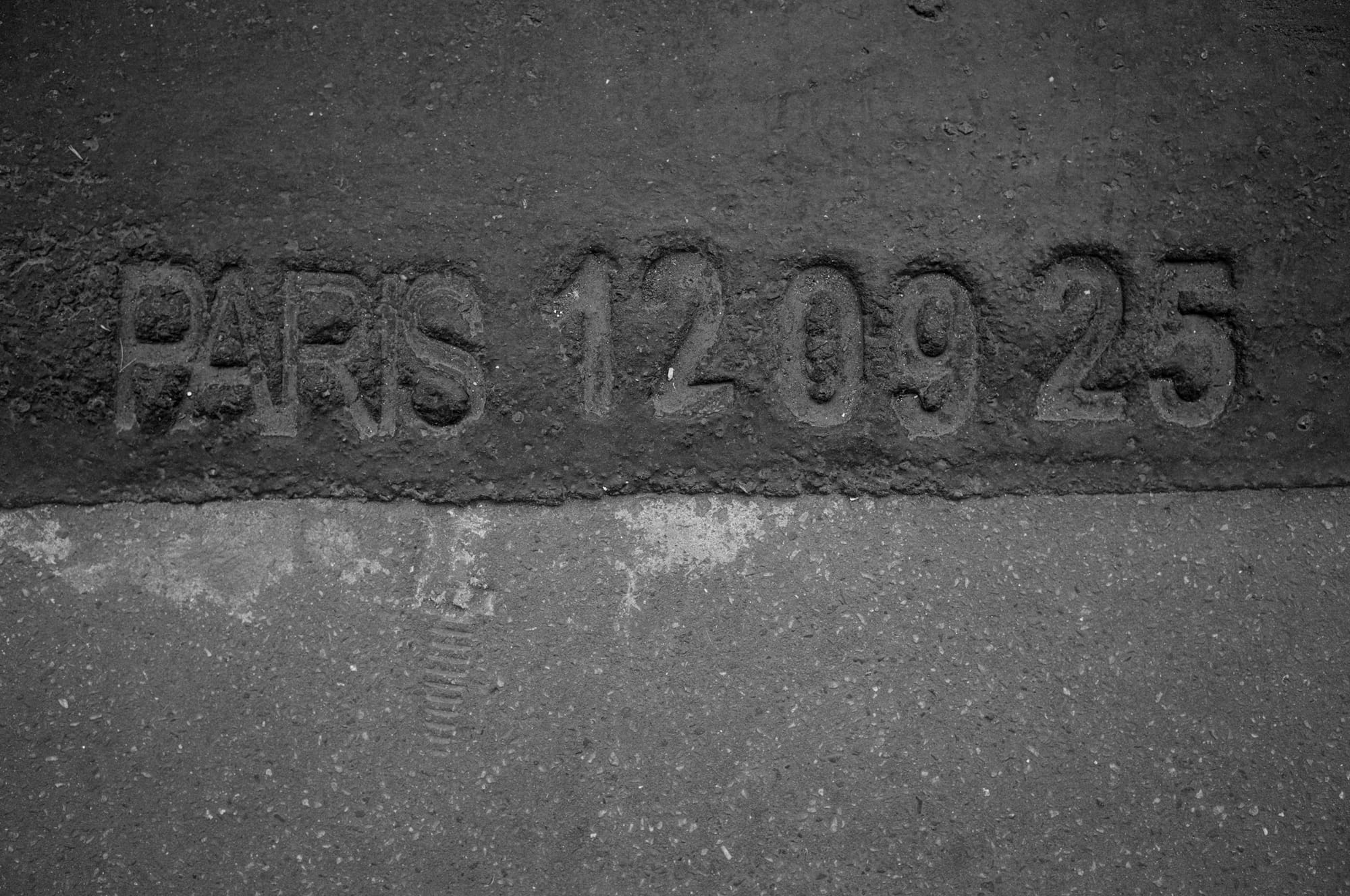 Stamped in the pavement: Paris, 12·09·25.