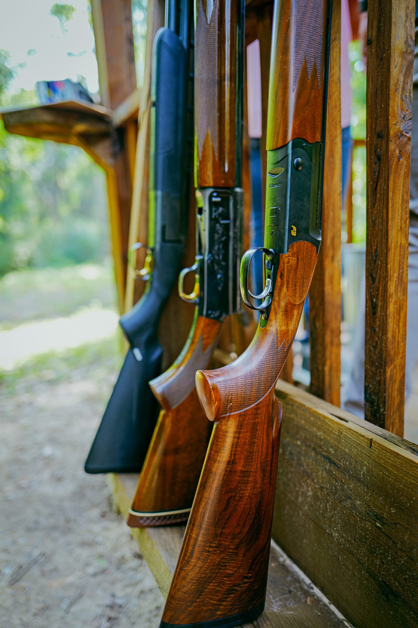Shotguns racked at the first station.