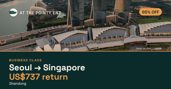 Business return to Singapore from US$737, about 65% off. Checked against live availability.