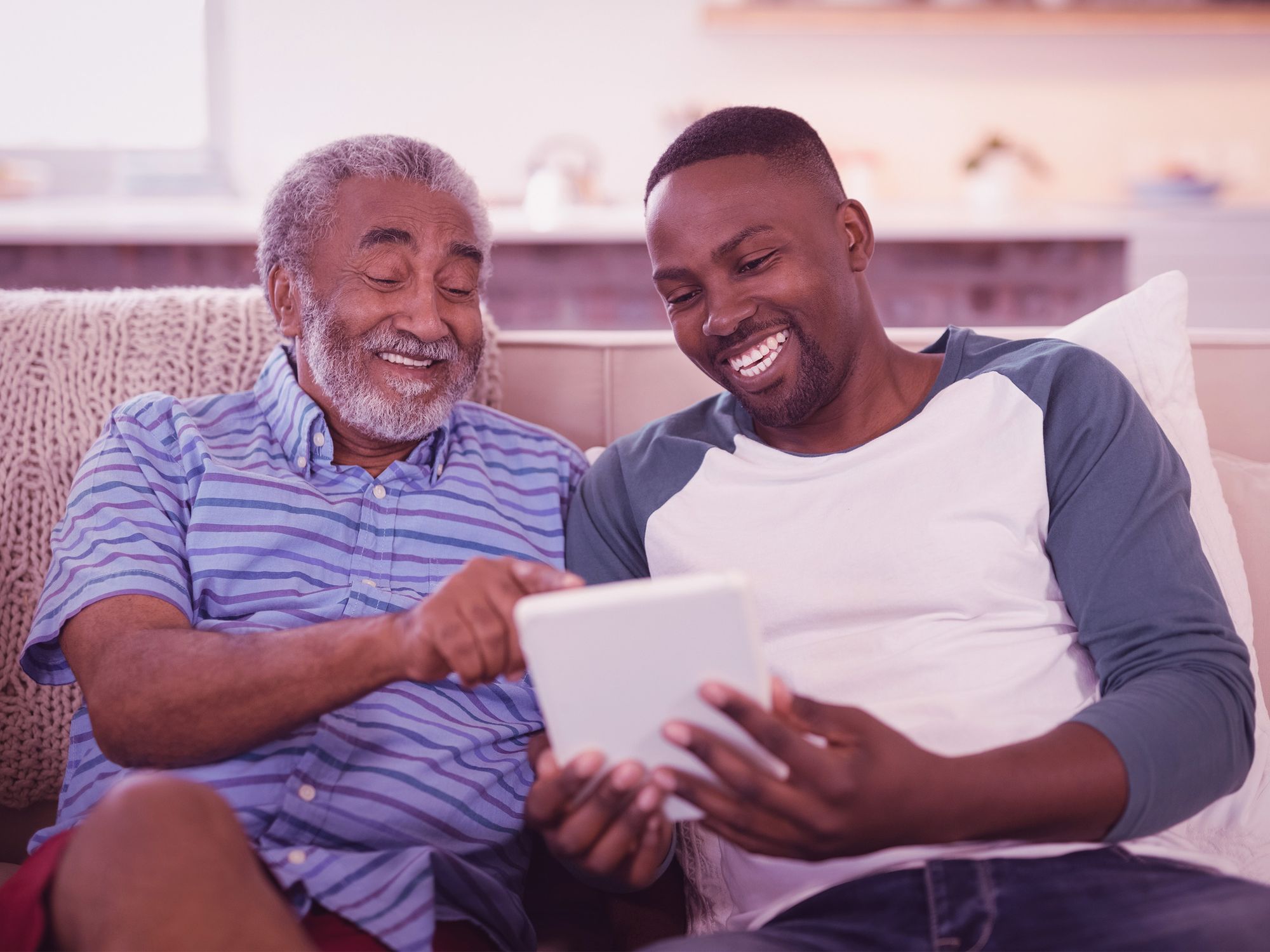 father-son-holding-tablet