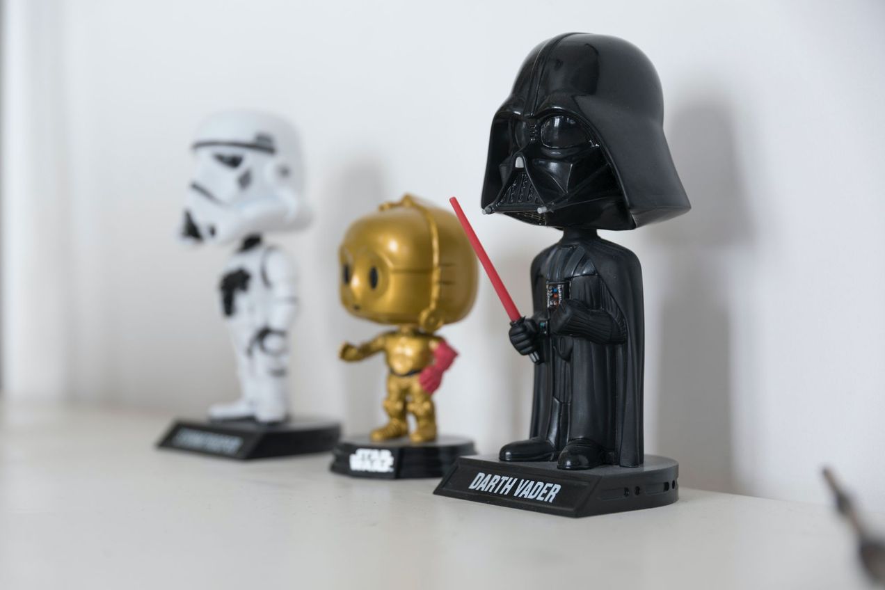 Star wars themed bobble heads in a row
