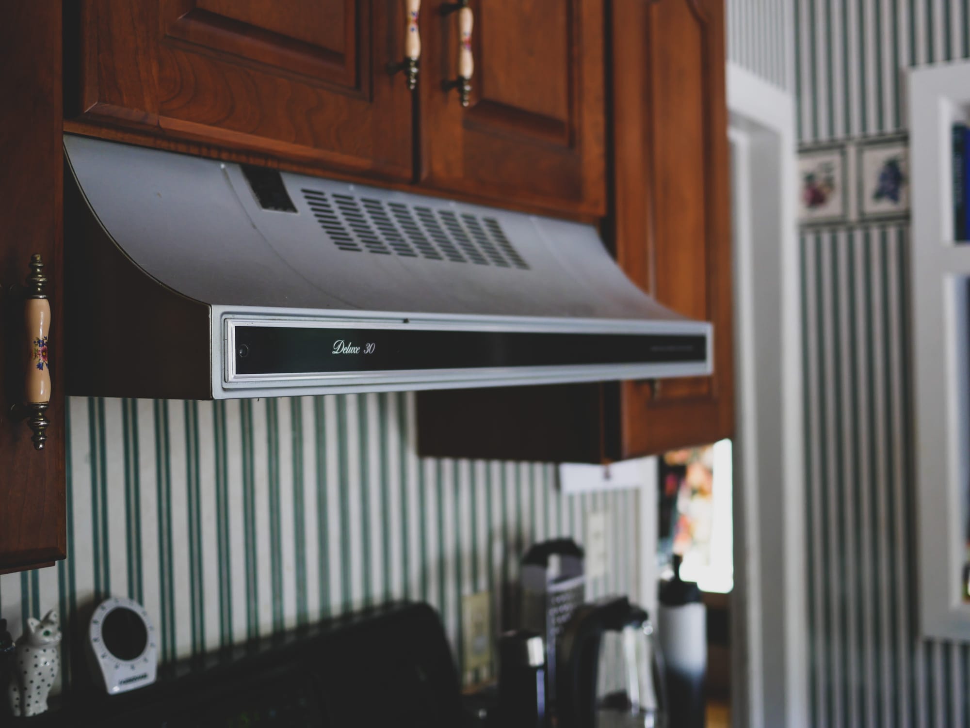 A Deluxe 30 range hood.