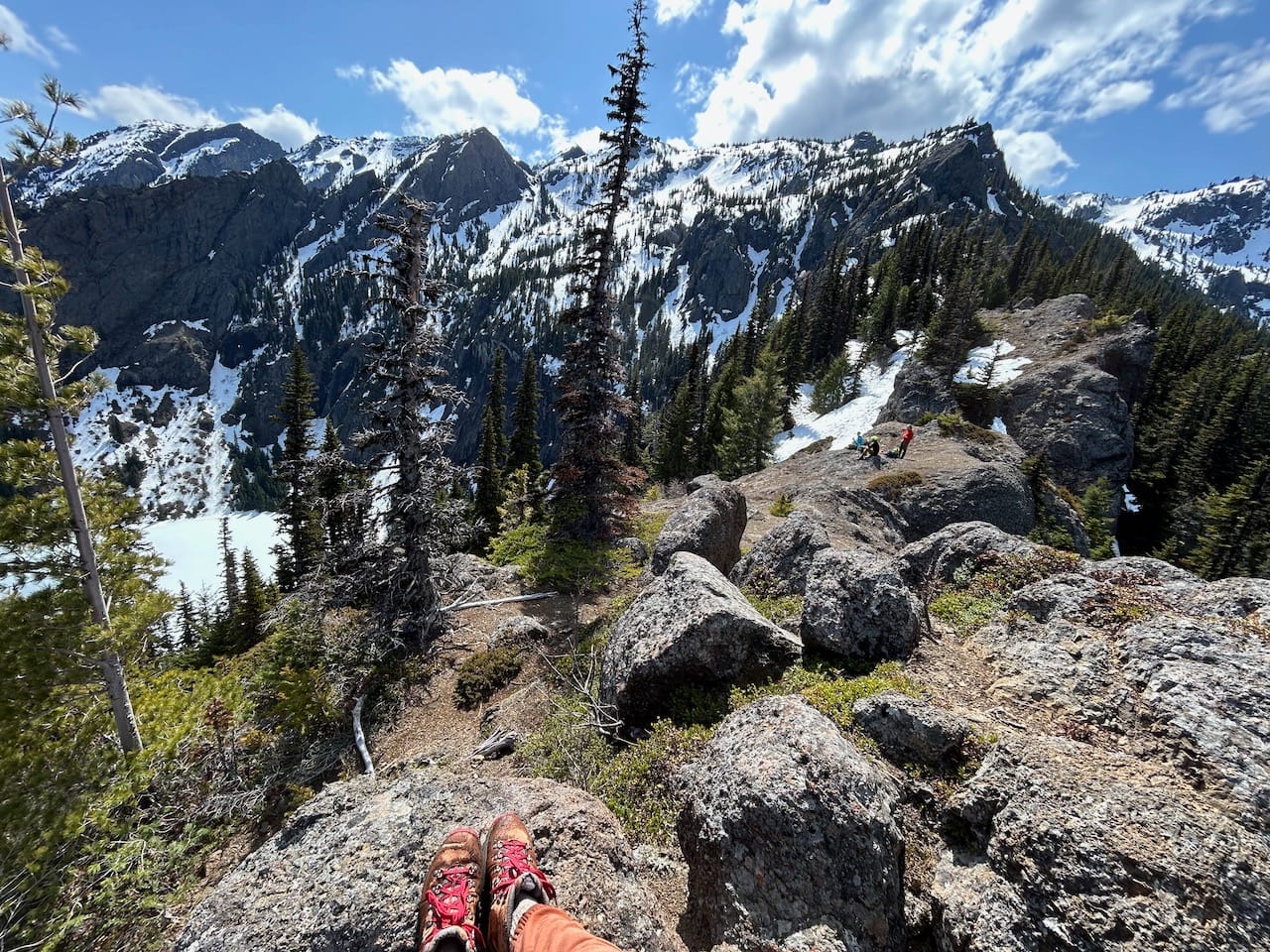 a photo of a snowy mountain range with my boots at the very bottom