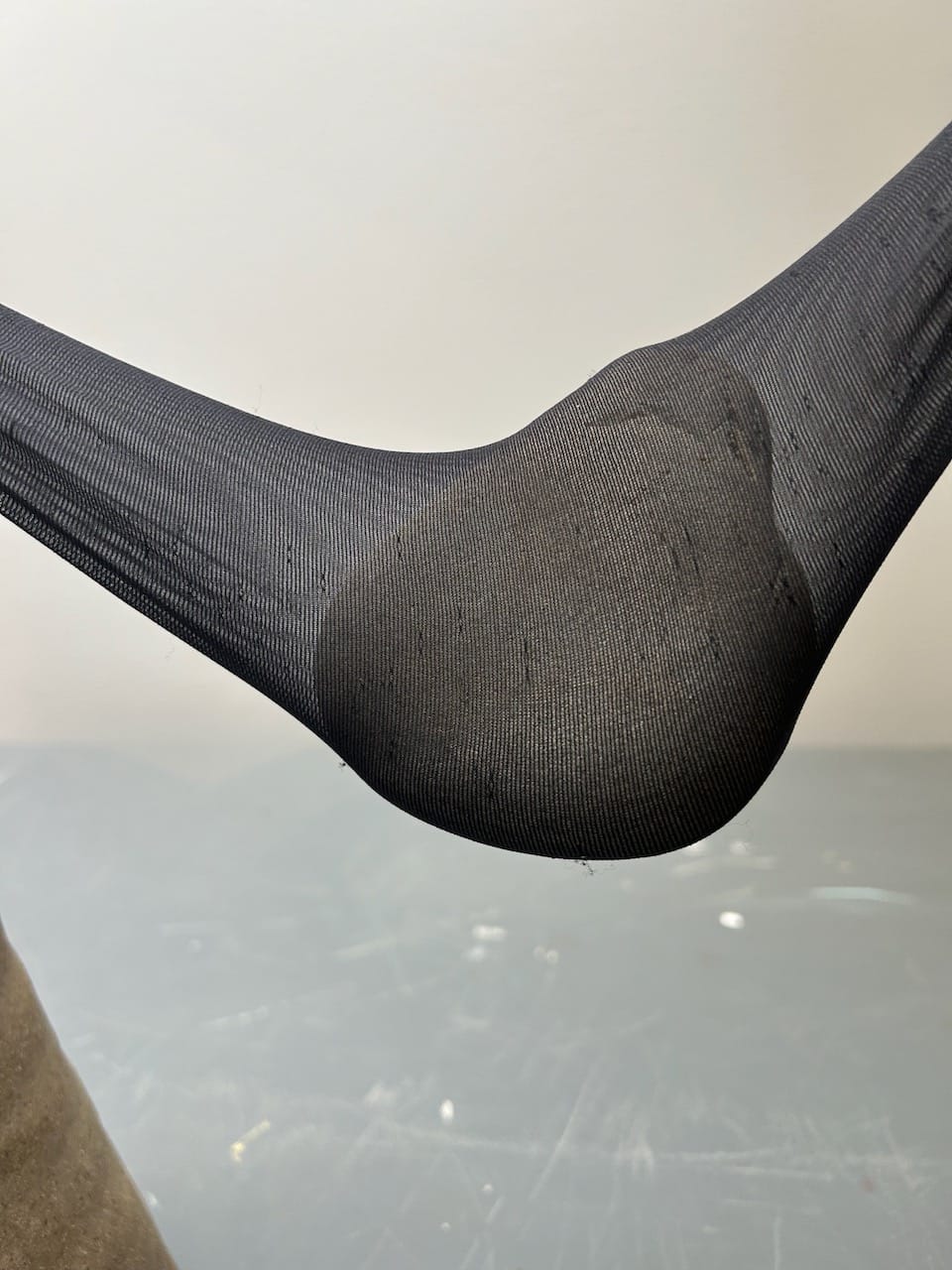 A closeup of the rock in the nylon so you can see it stretched across