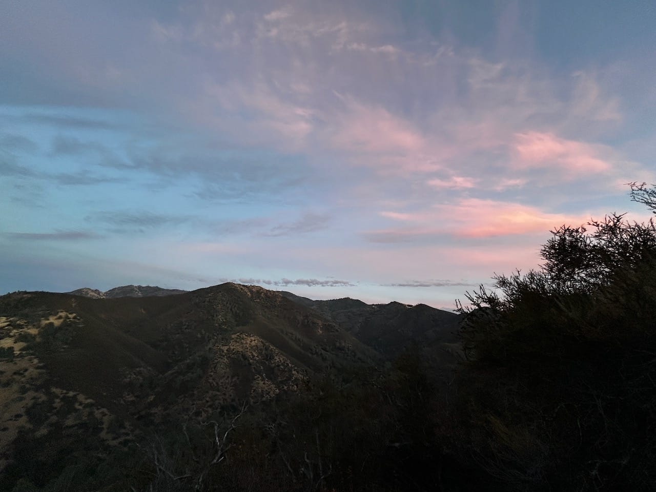 A gauzy pink sunset over the Mount Diablo hills.