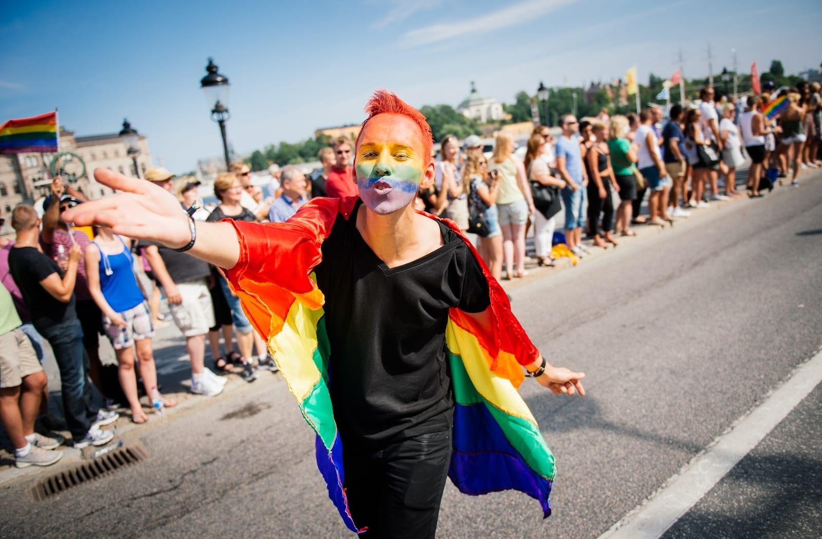 sweden pride parade rainbow face paint flag