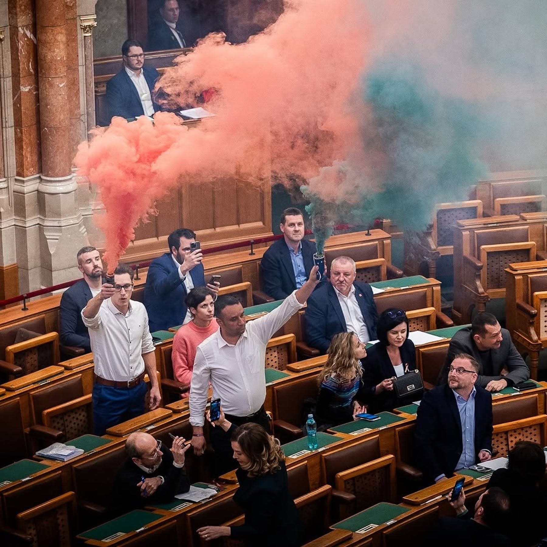 opposition mps throw smoke bomb inside hungary parliament.jpg