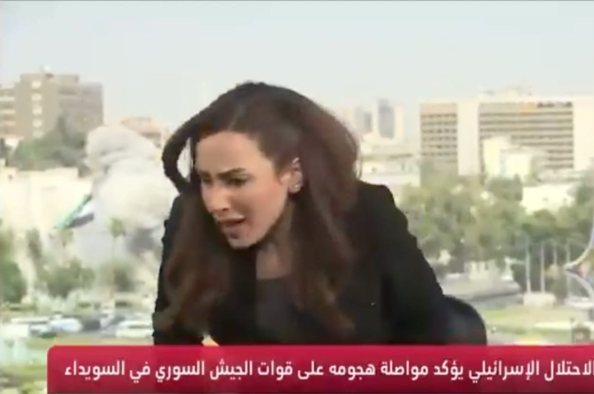 israel bomb syria tv anchor flee live broadcast