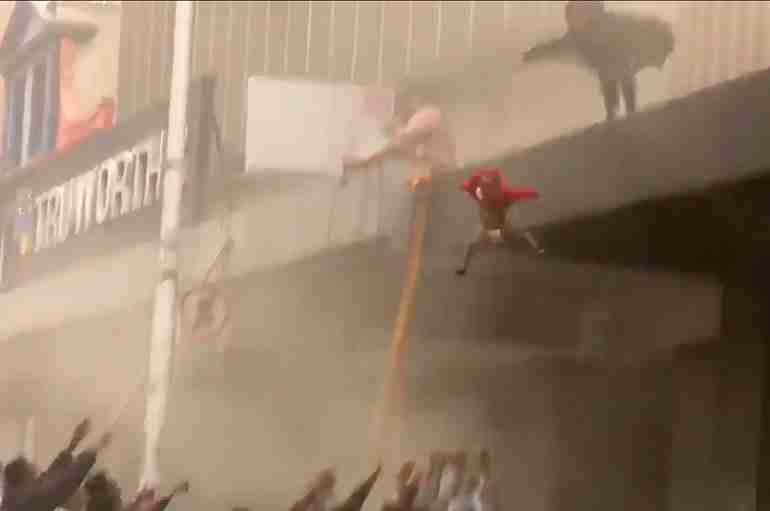 south africa mom throws baby durban riots