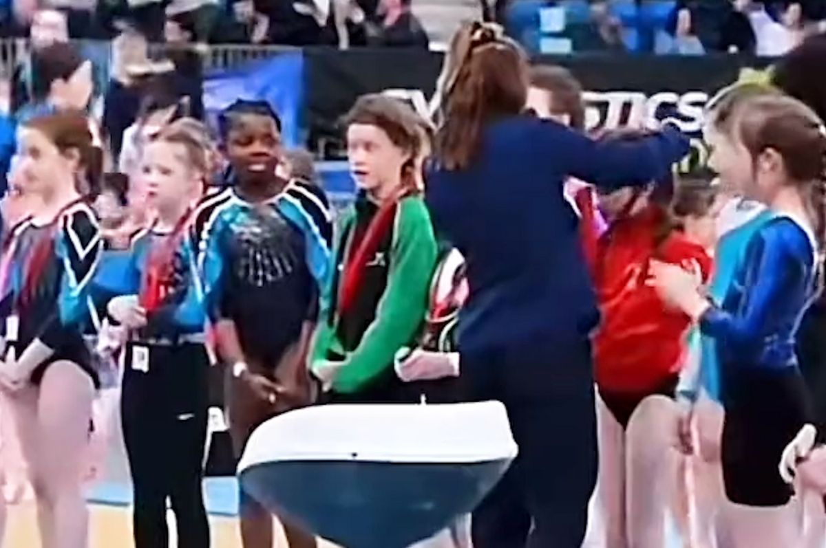 ireland gymnastics black girl medal skipped apology