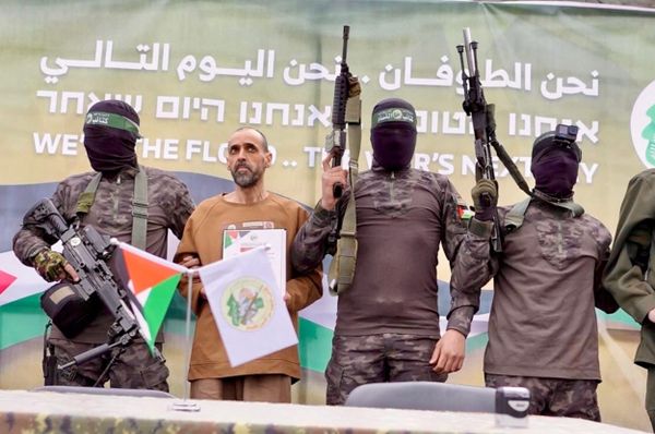 hamas postpone hostage release israel violations ceasefire