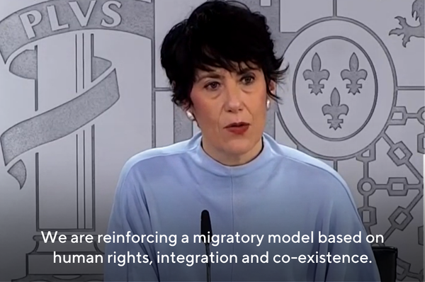 spain undocumented immigrants legal status grant