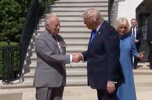 Trump King Charles handshake tug of war