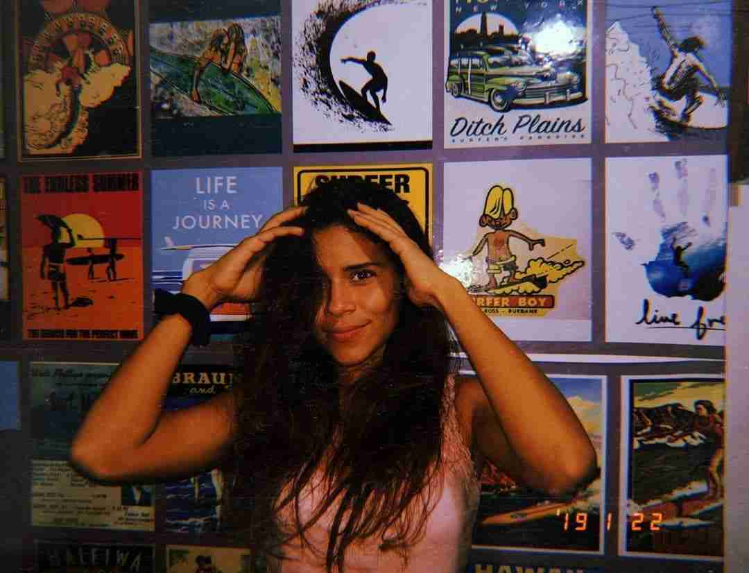 Katherine touched hair and smile photo.