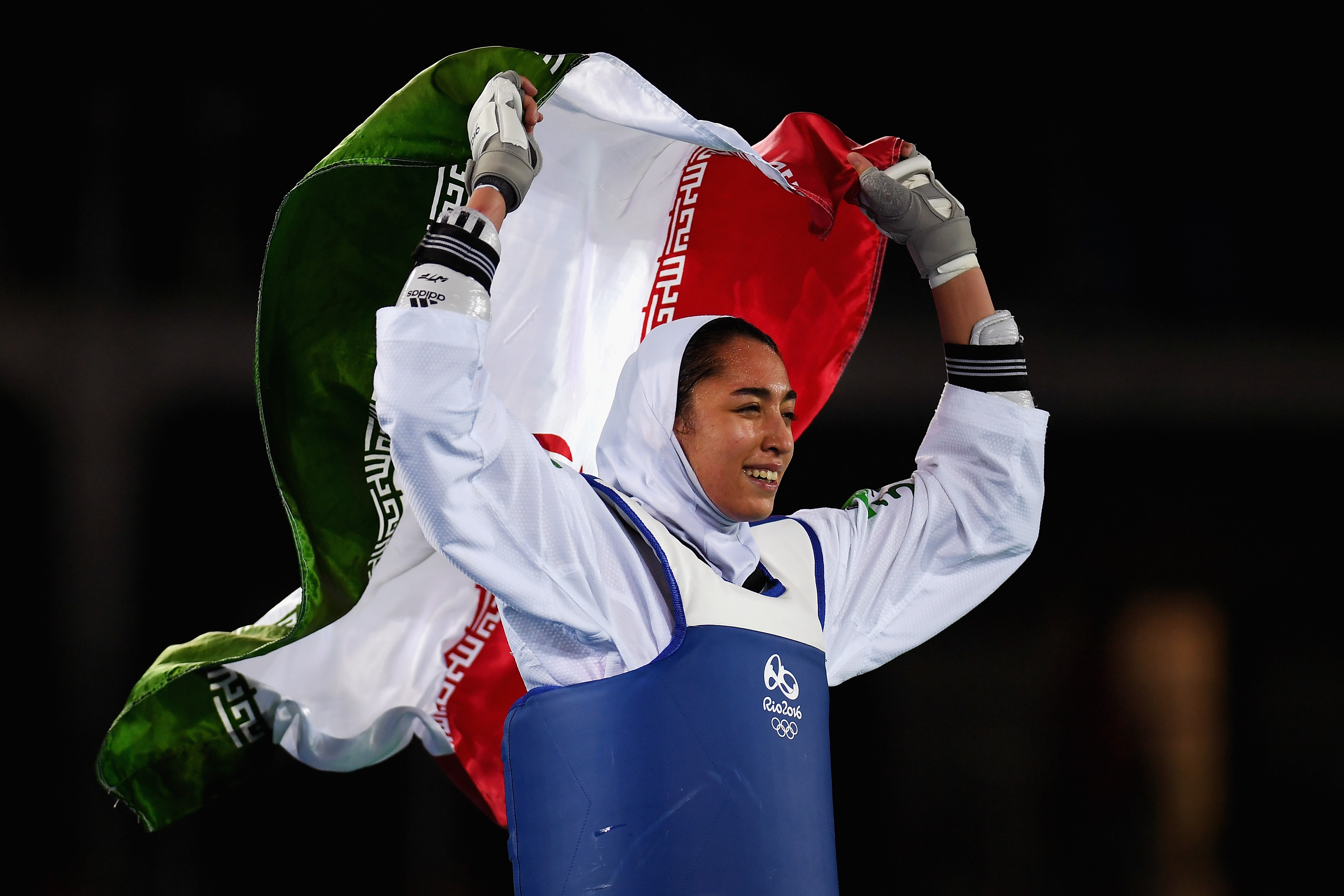 Alizadeh from the Islamic Republic of Iran celebrates win for Women's -57kg Bronze Medal Taekwondo contest at 2016 Rio Olympic Games. 