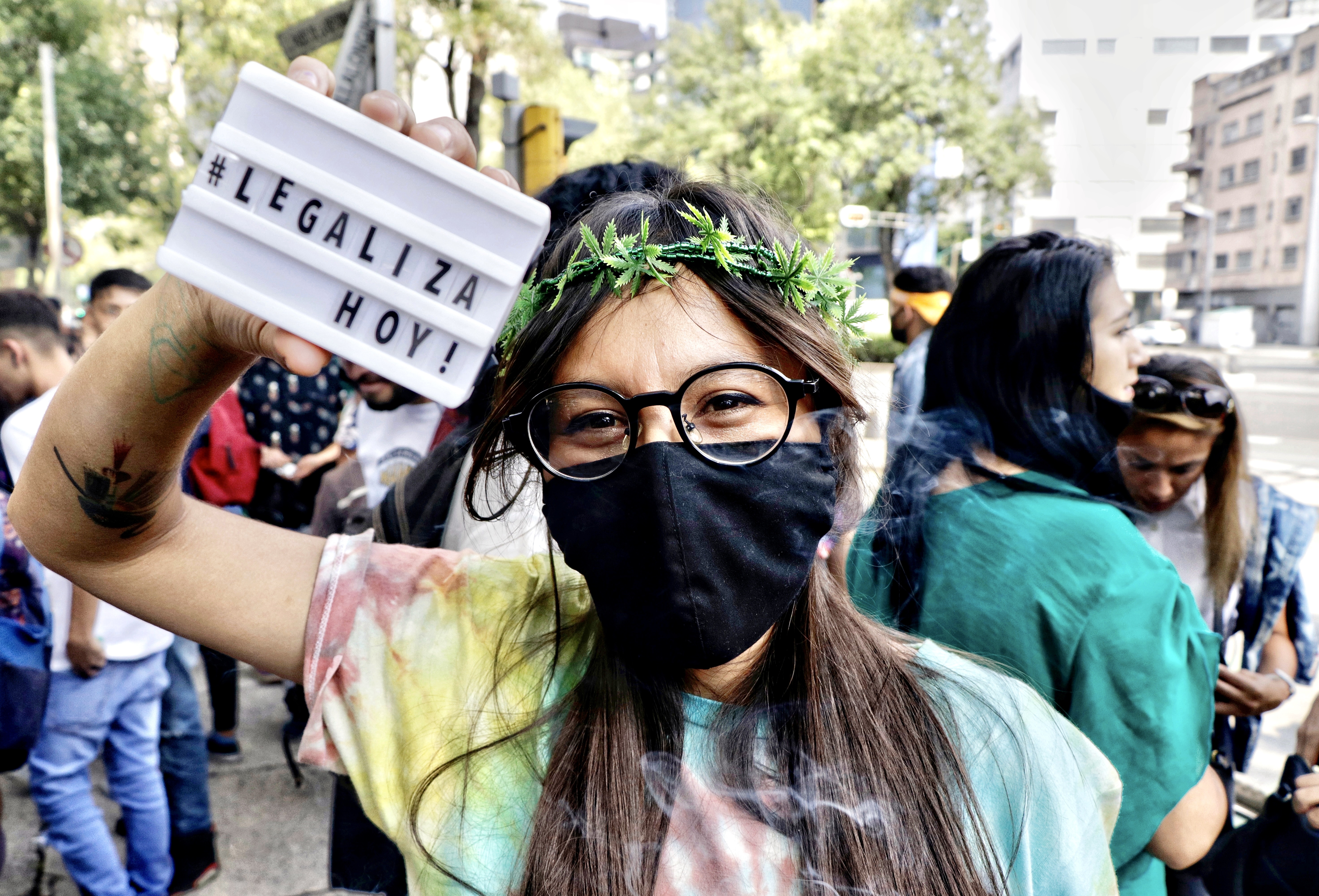 People are in favor of legalizes marijuana during rally.